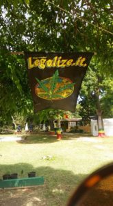 Jamaica road trip. Legalize marijuana banner at the home of Peter Tosh.