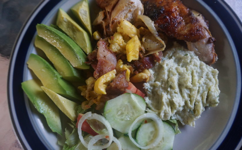 Jamaican Keto Food! Roasted chicken ackee and corned pork. cauliflower mash, salad and ripe avocado