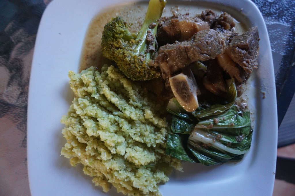 Stewed pork with greens and cauliflower "fried rice".