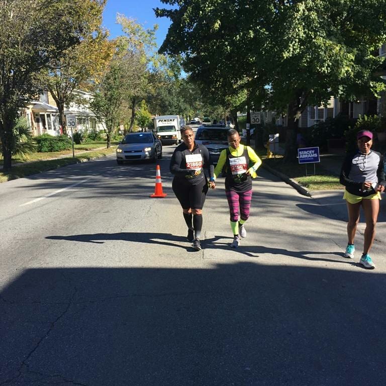 Only a few miles to go and quitting is not an option! Naki pulls Marlene along.