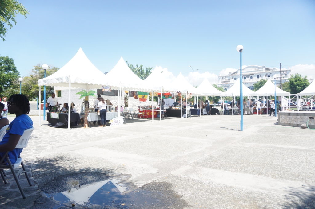 Market Street set up in the St  William Grant Park Downtown Kingston. The historic Ward Theater currently being refurbished is in the background.