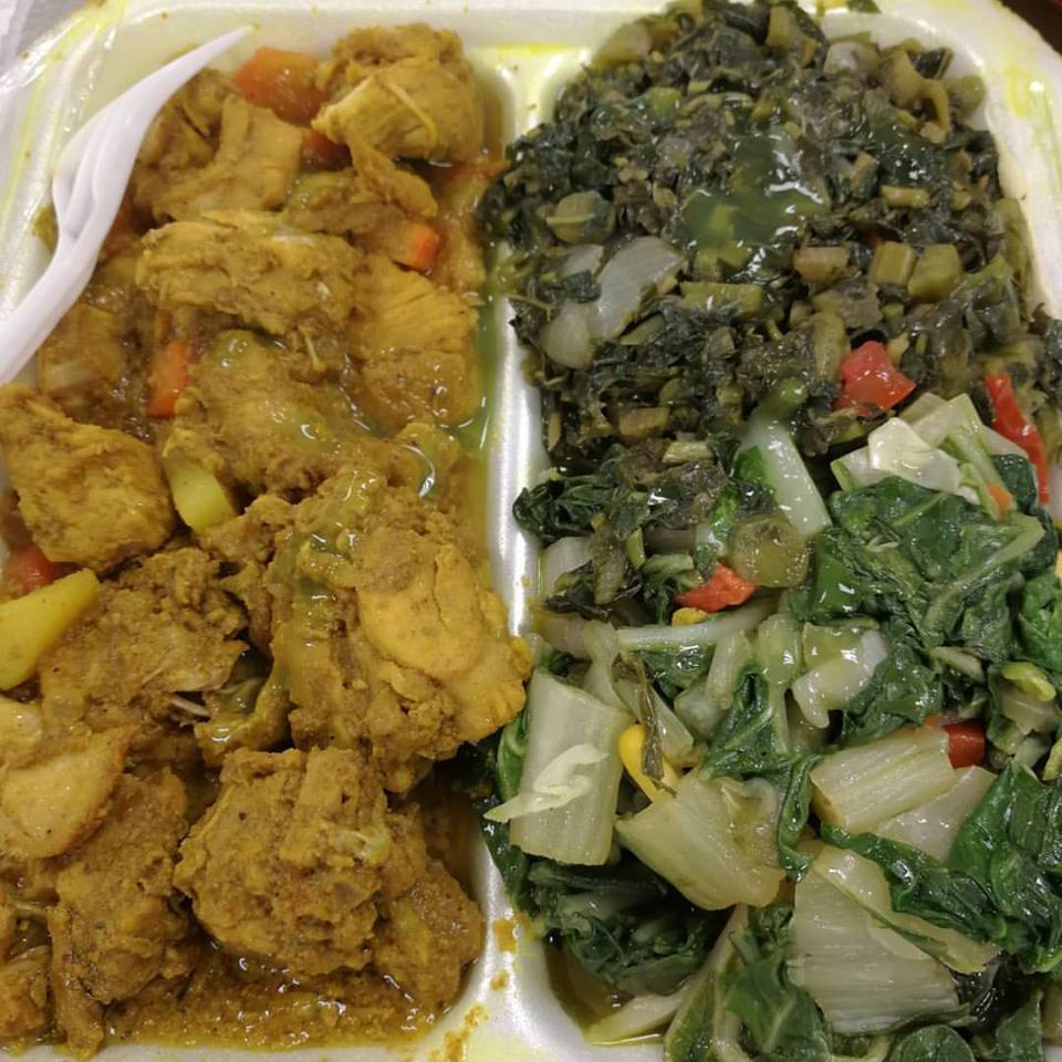 Curried chicken and callaloo with pak choi