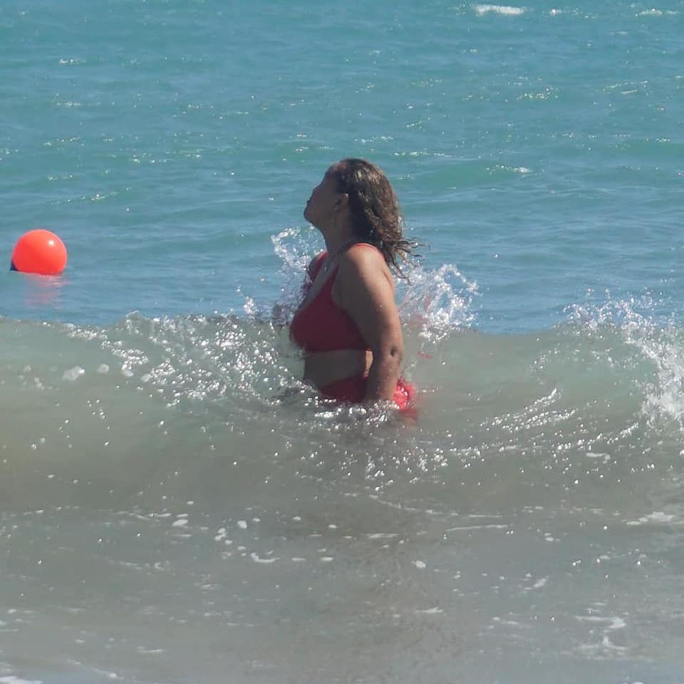 Braving the rough surf at Treasure Beach